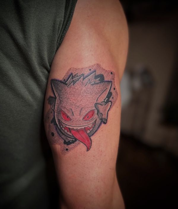 Gengar Pokemon tattoo by LoLo, on the upper arm