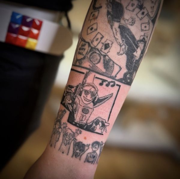 Manga sleeve tattoo by LoLo, on the forearm