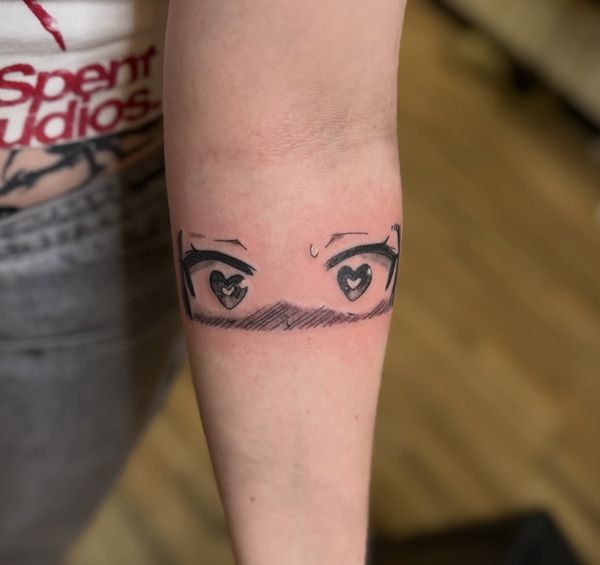 Anime eye flash tattoo by LoLo, on the forearm